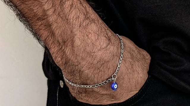 Figaro bracelet with blue eye